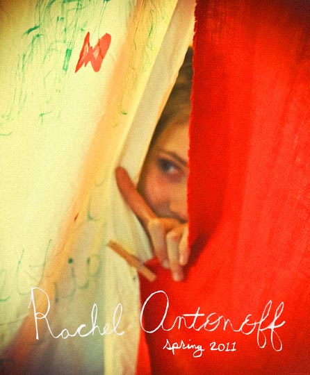 Artist Danny Roberts Photo of a girl Peeking between a white and Red Sheet held together by a close pins. Picture is from Rachel Antonoff Spring 2011 Collection